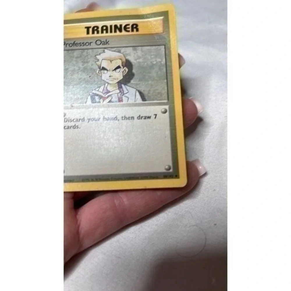 Pokémon Professor Oak 88/102 Card.